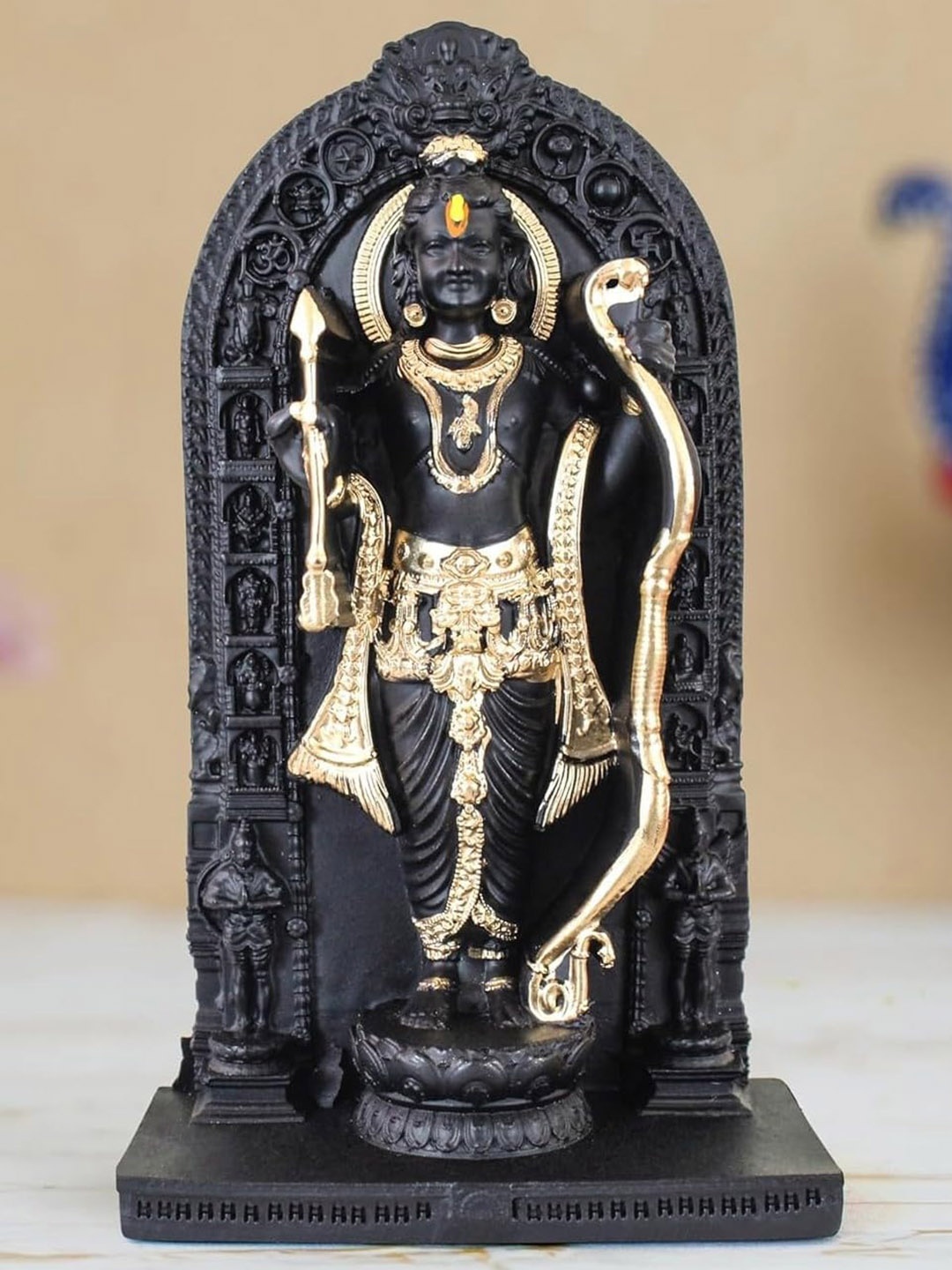 

Floweraura Black & Gold Toned Lord Ram Lala Idol Showpiece