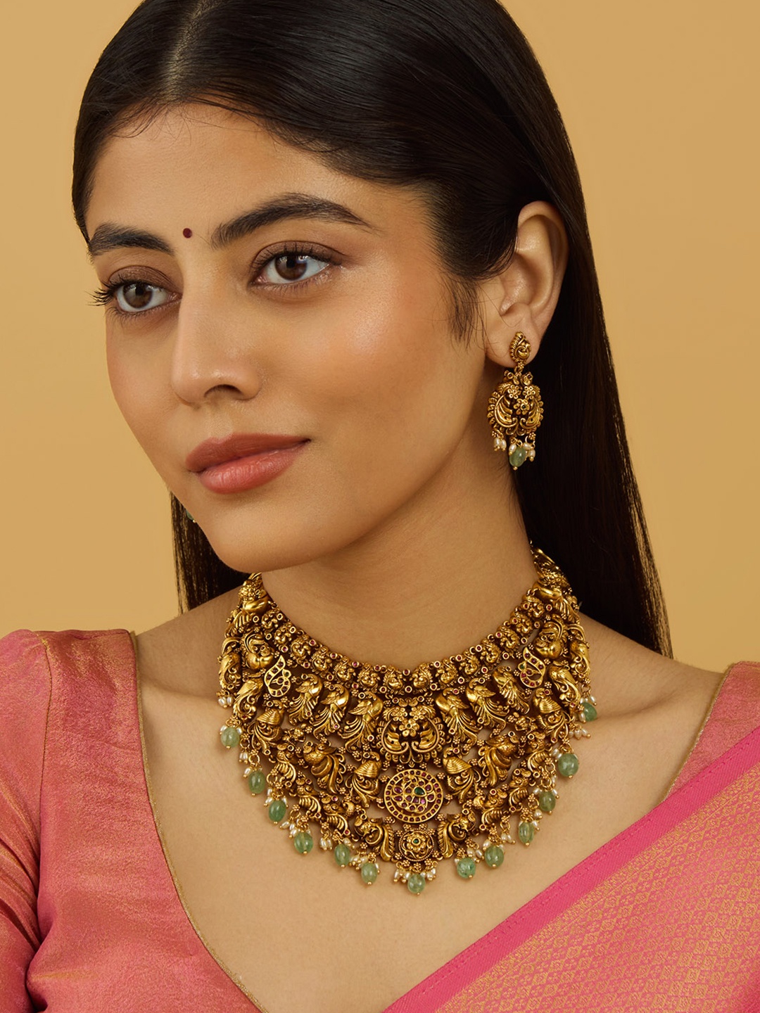 

Kushal's Fashion Jewellery Gold Plated Stones Studded Antique Necklace & Earrings