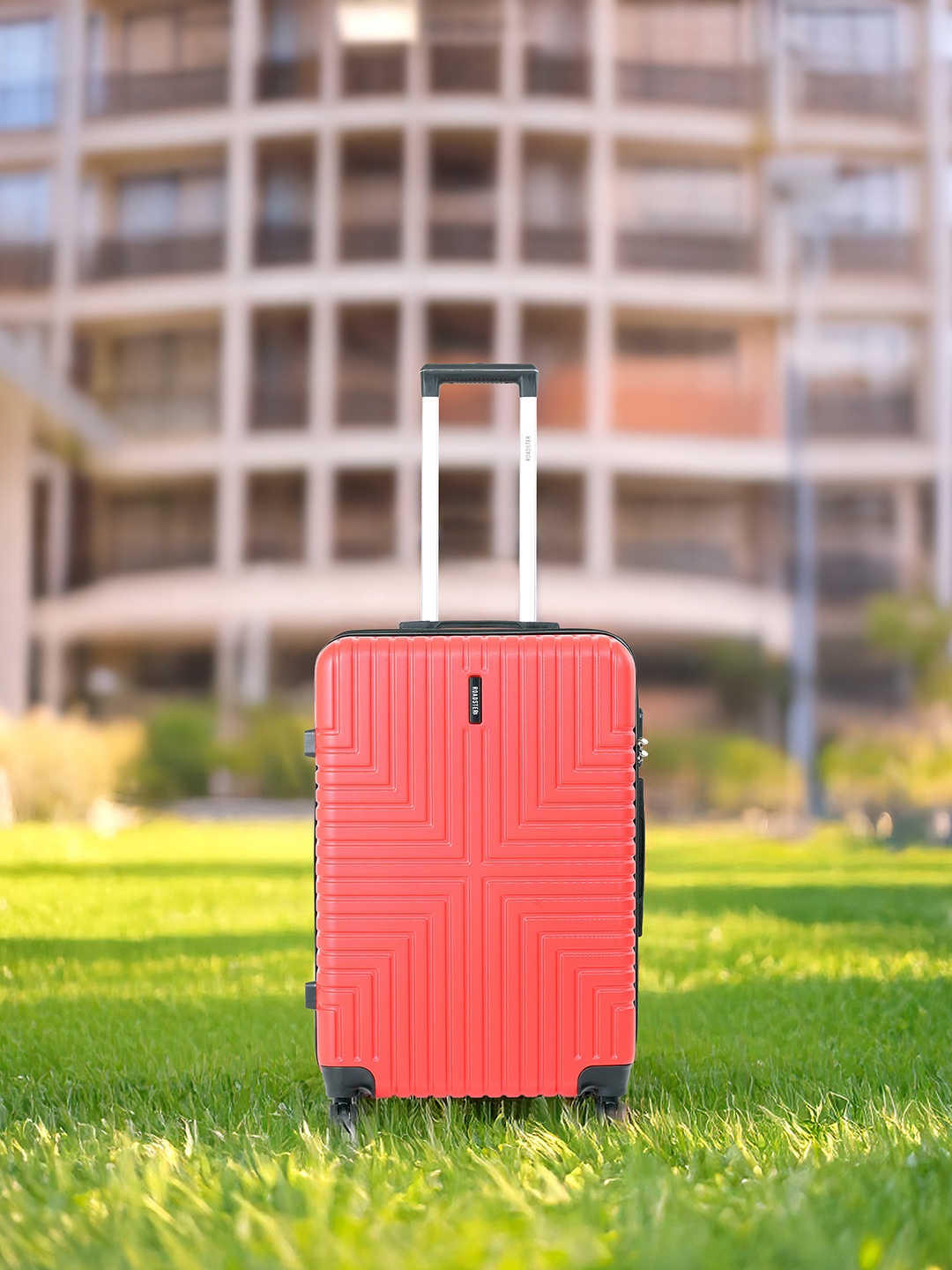 

Roadster Unisex Textured Hard Sided Medium Trolley Suitcase- 55.7 L, Red