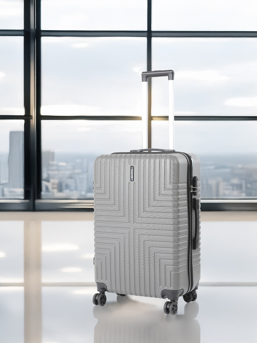

Roadster Unisex Textured HRD Large Hard Suitcase Trolley Bag- 80.2 L, Grey