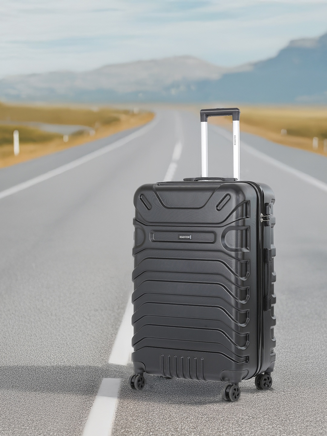

Roadster Unisex Textured HRD Large Hard Suitcase Trolley Bag- 80.2 L, Black