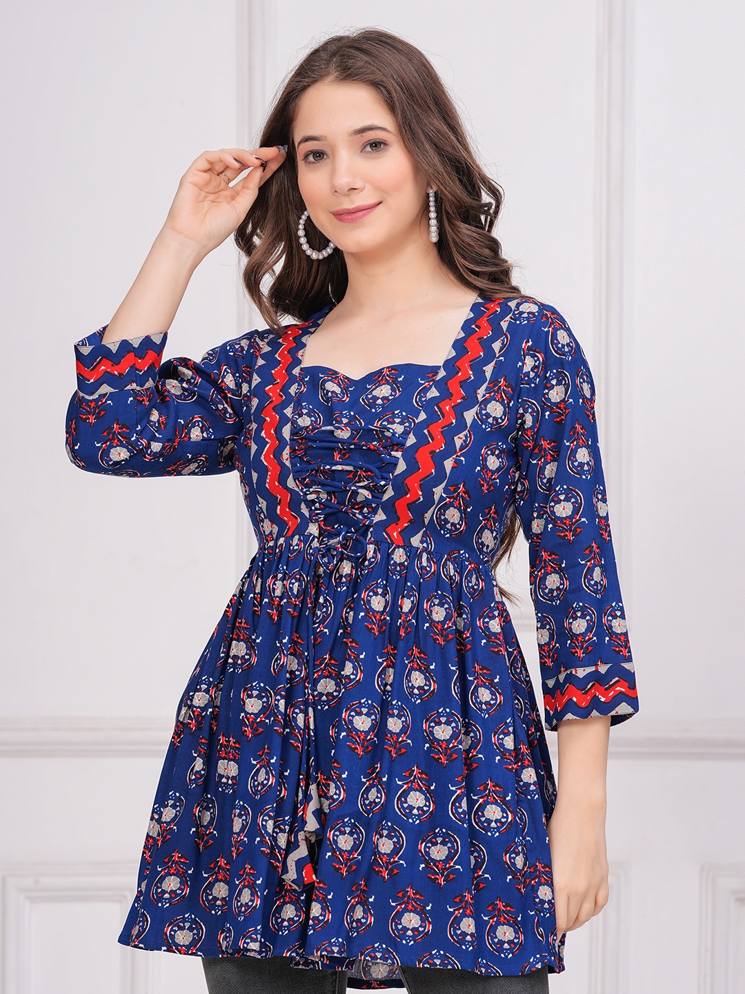 

INDIANIC Women Floral Printed Peplum Regular Top, Blue