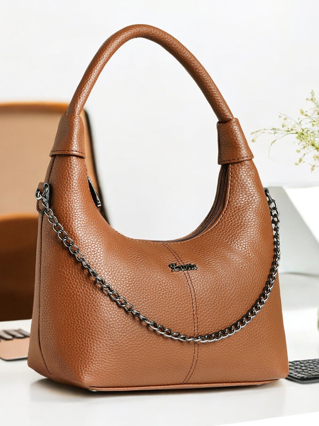 

Exotic Textured Swagger Sling Bag, Brown