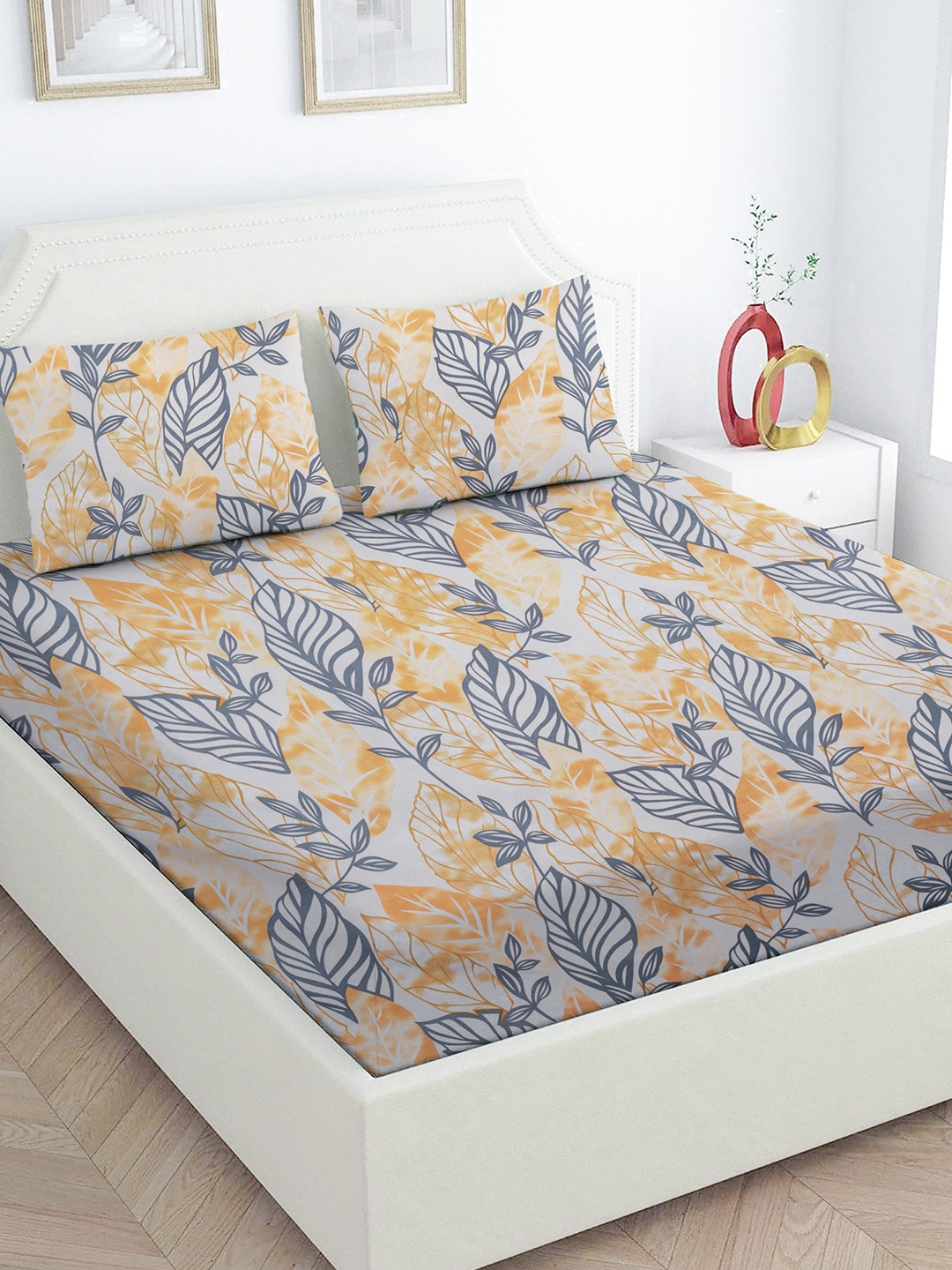 

Star Weaves Yellow & Blue Floral Printed 200 TC Fitted King Bedsheet Set 1.98 m x 1.82 m
