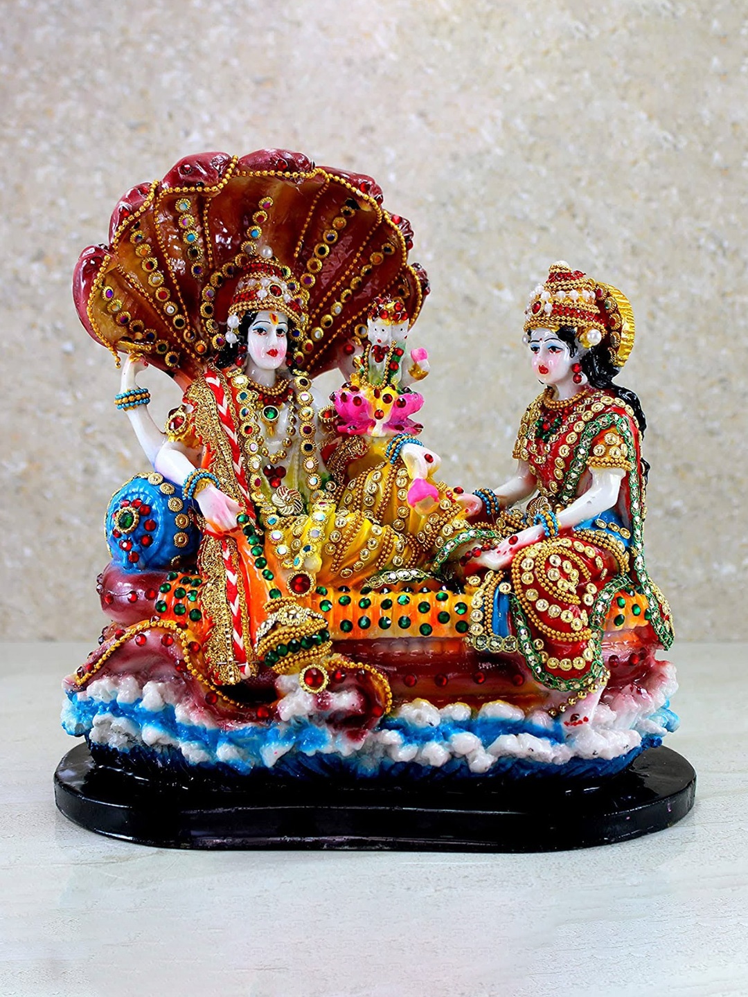 

NAYRA HANDICRAFTS Red Laxmi Narayan Idol on Sheshnaag Religious Idol Showpiece