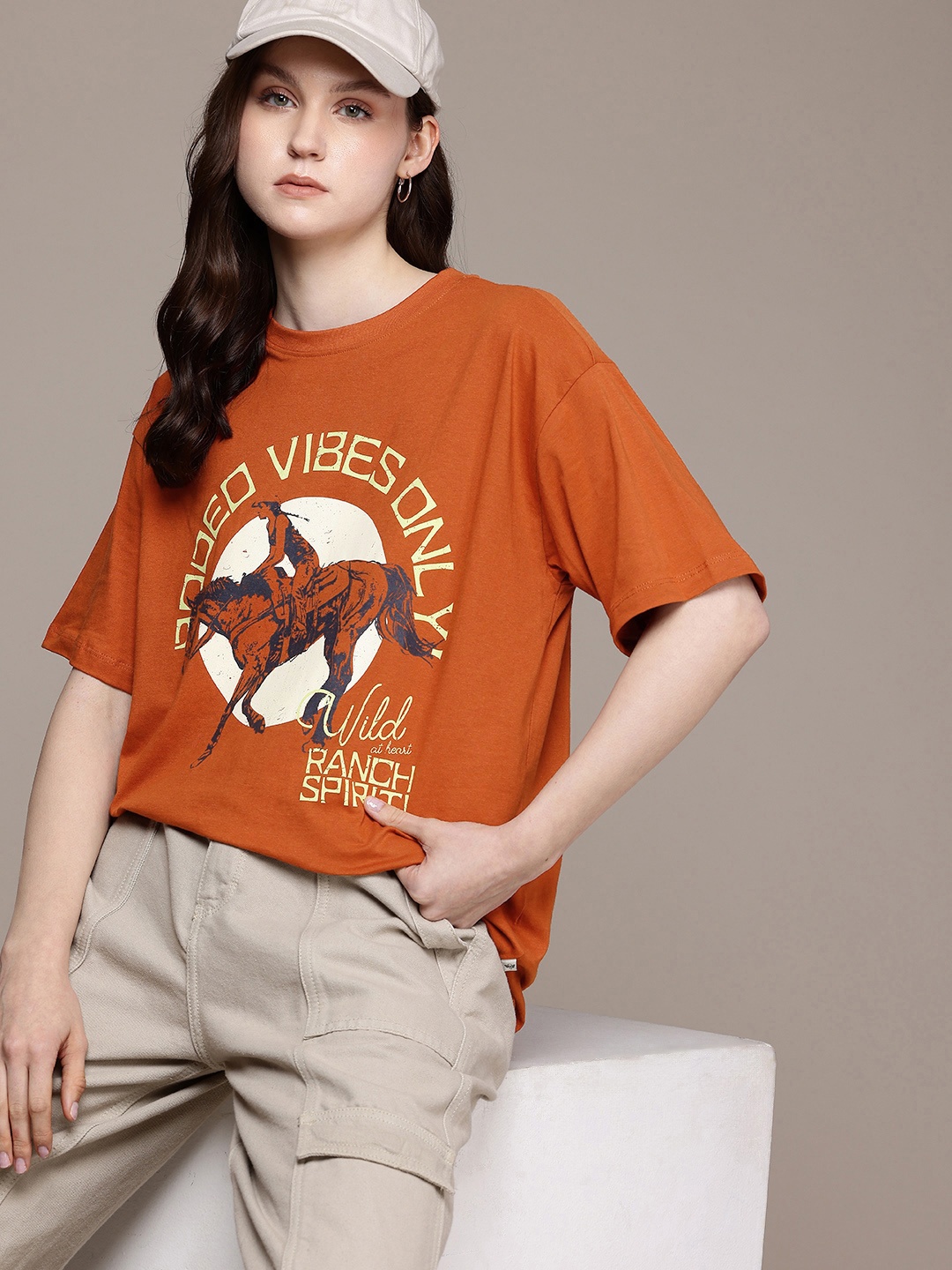 

The Roadster Life Co. Graphic Printed Drop-Shoulder Sleeves Relaxed Pure Cotton T-shirt, Rust