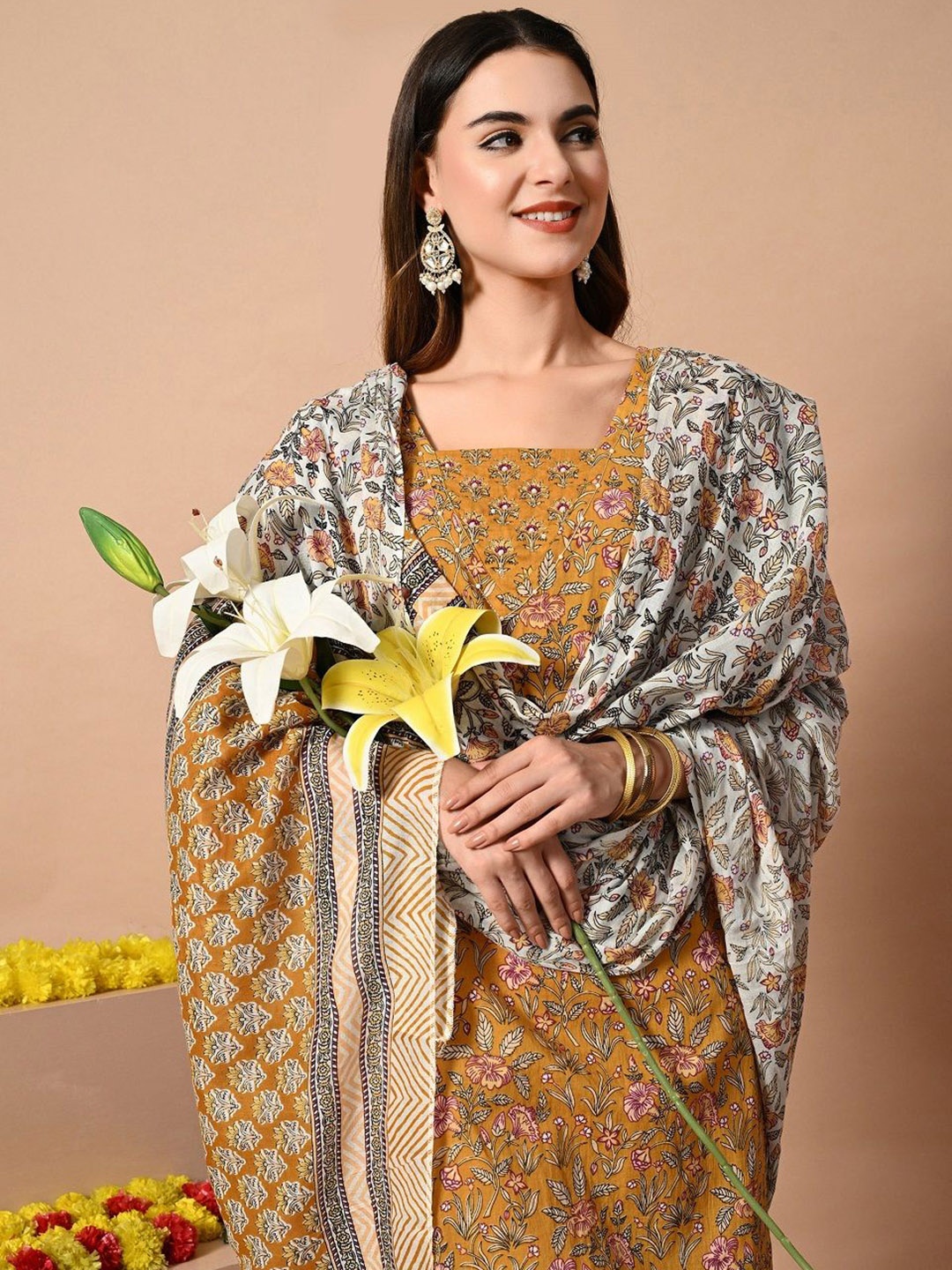 

DHROOV TARA Women Floral Printed Regular Kurta with Trousers & With Dupatta, Mustard