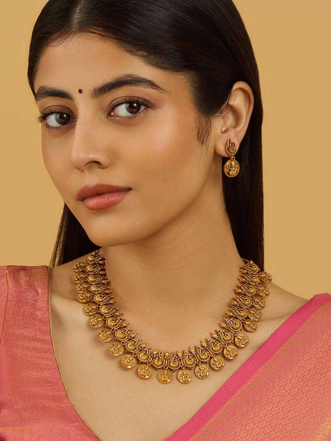 

Kushal's Fashion Jewellery Gold-Plated Stone Studded Lakshmi Goddess Antique Jewellery Set