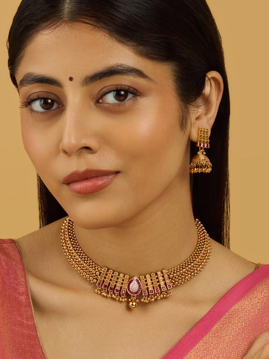

Kushal's Fashion Jewellery Gold-Plated Stone-Studded Antique Jewellery Set