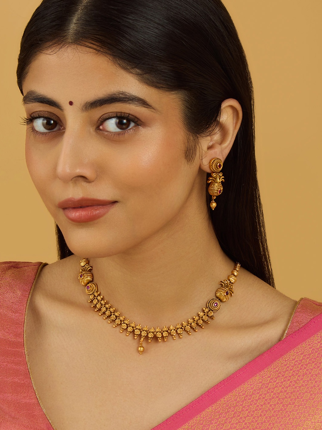 

Kushal's Fashion Jewellery Gold-Plated Stone Studded Antique Jewellery Set