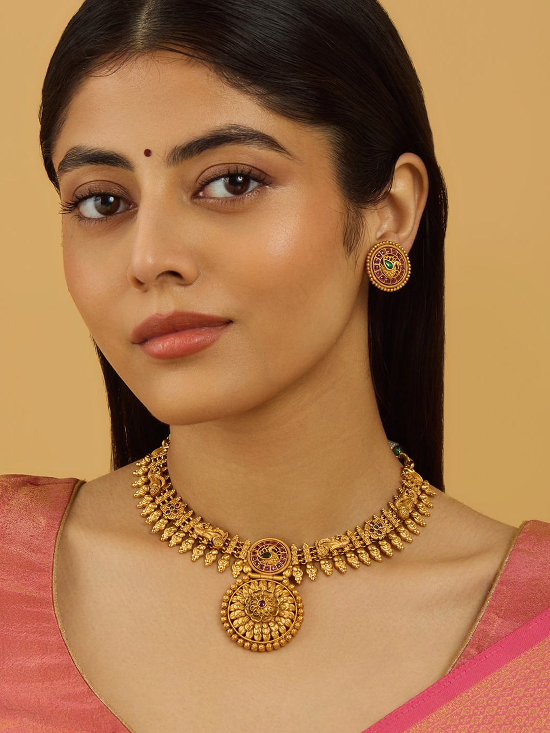 

Kushal's Fashion Jewellery Gold-Plated Stone-Studded Antique Jewellery Set