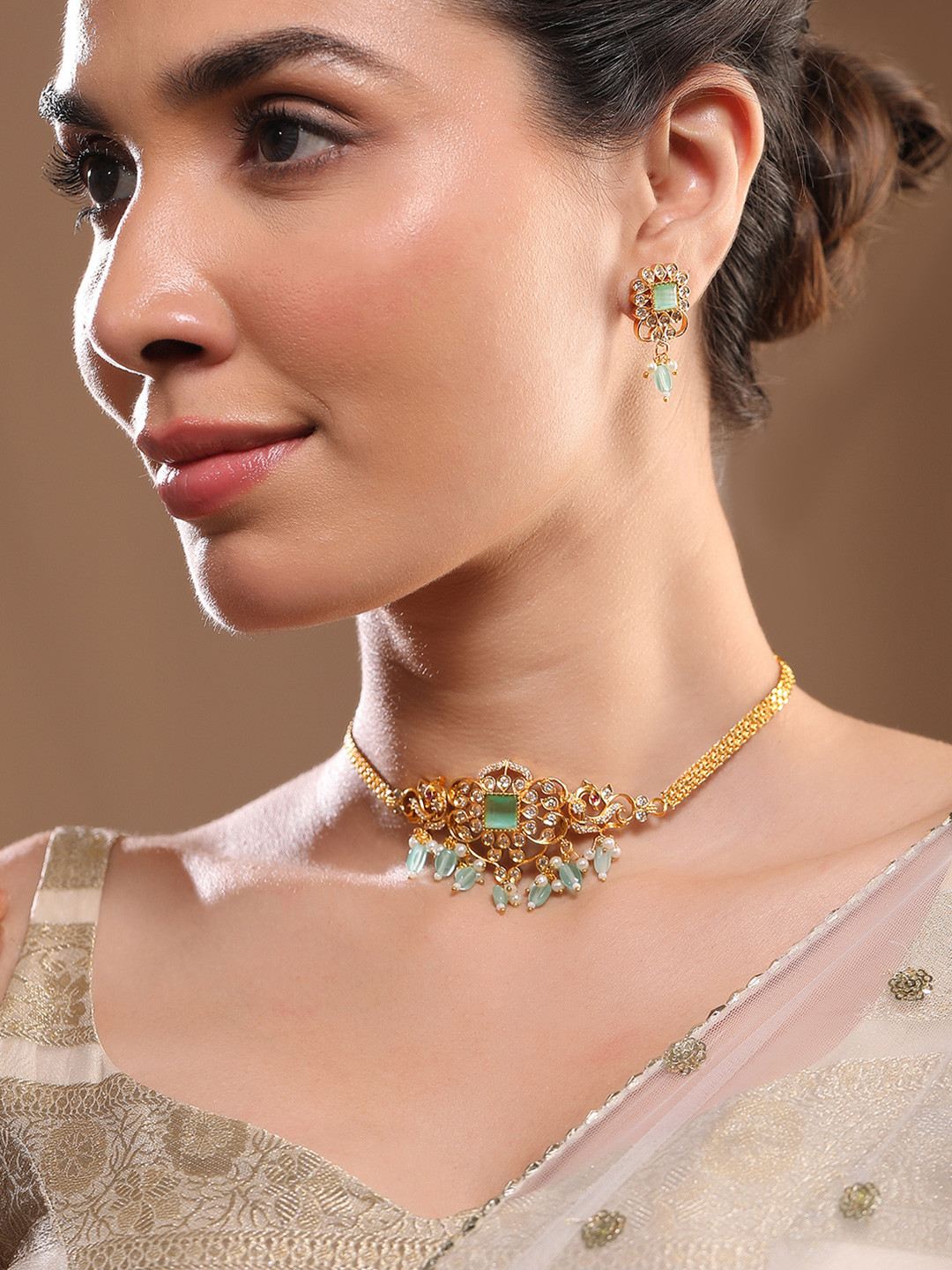 

Rubans 22K Gold Plated Aqua Green & Cubic Zirconia Choker Set with Green & Pearl Beads