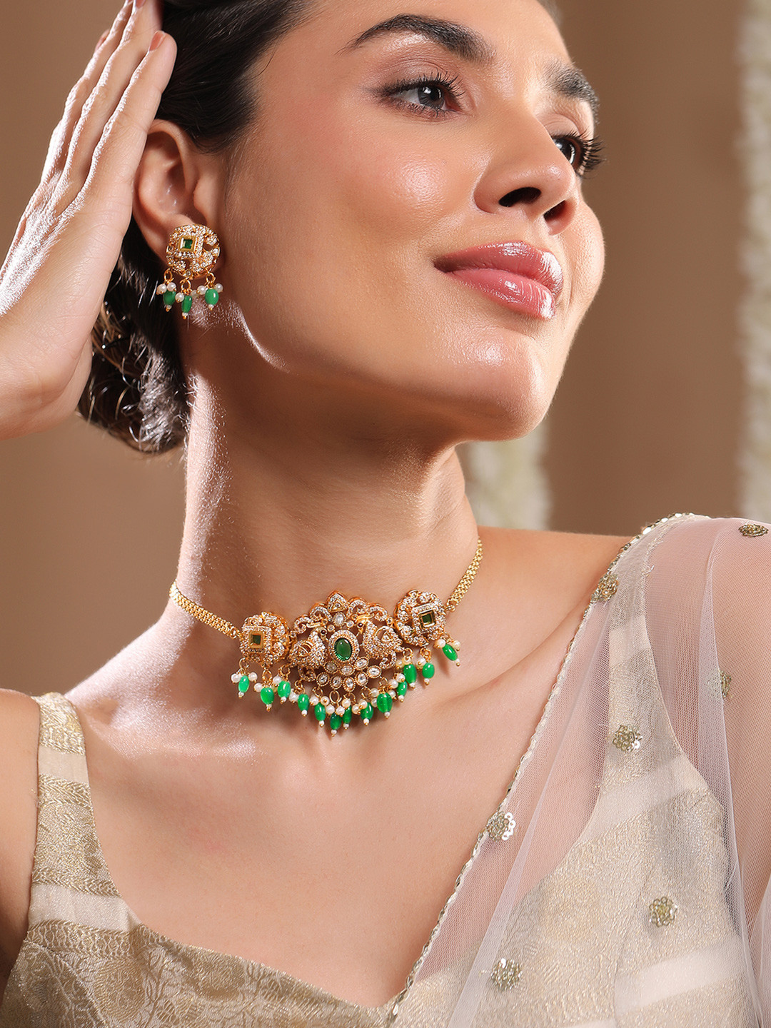 

Rubans 22K Gold Plated Emerald Green & Cubic Zirconia Choker Set with Green & Pearl Beads