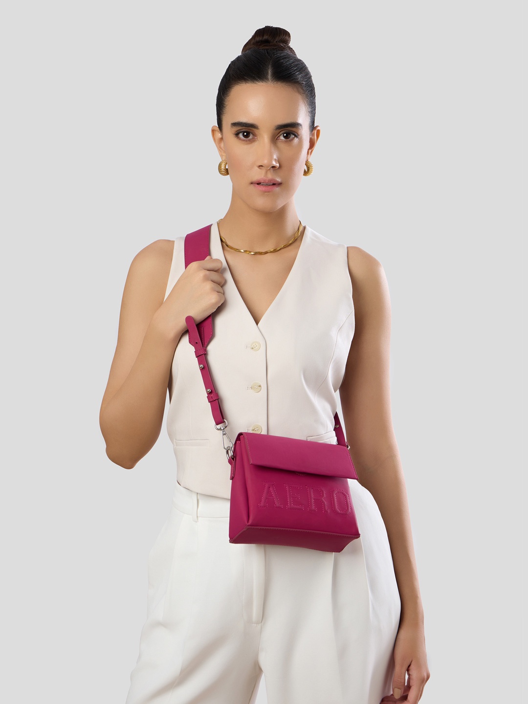 

Aeropostale PU Swagger Sling Bag with Cut Work, Pink