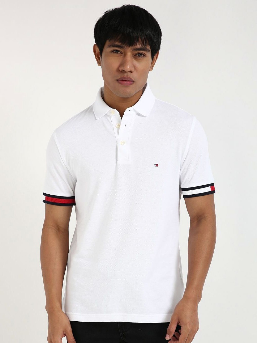 

Tommy Hilfiger Men Solid Polo Collar Cotton T-shirt, White