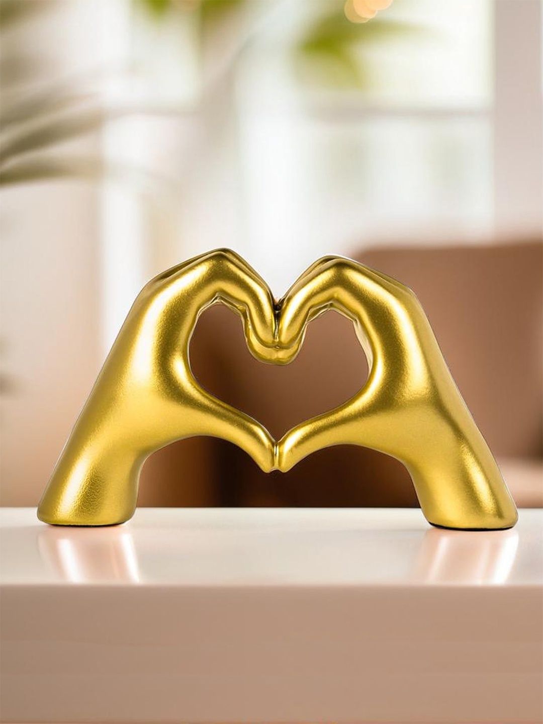 

Ekhasa Gold-Toned Love Hands Heart Figurine Showpiece