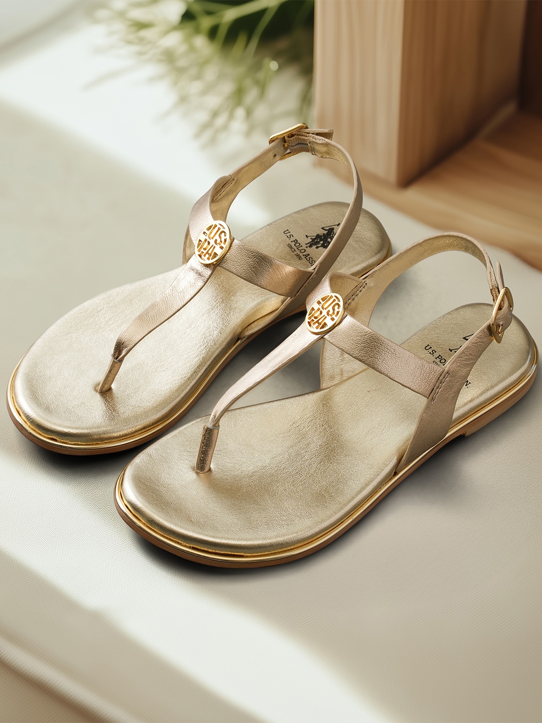 

U.S. Polo Assn. Women T-Strap Flats, Gold