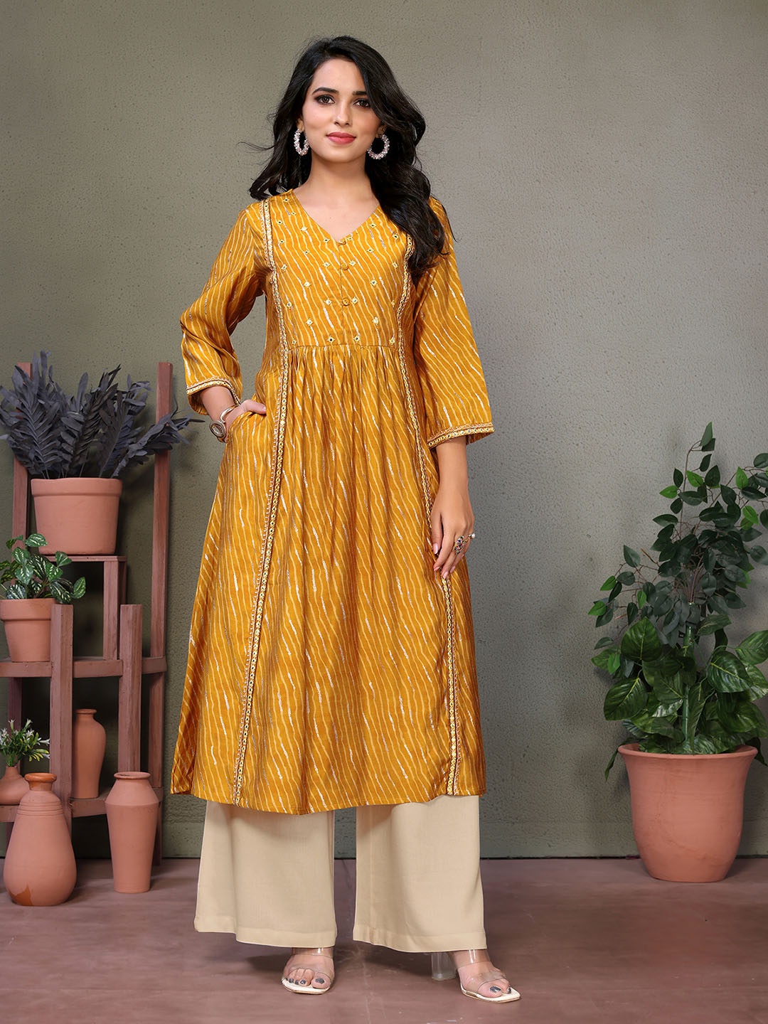

Rangita Women Embroidered Mirror Work Chanderi Silk Anarkali Kurta, Mustard