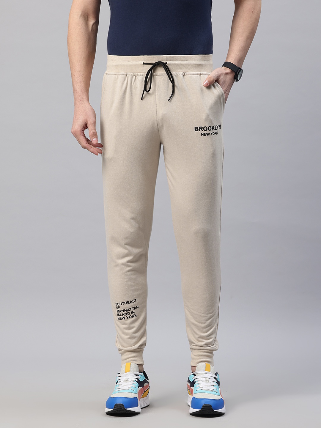 

POSHAX Men Typography Printed Joggers, Beige