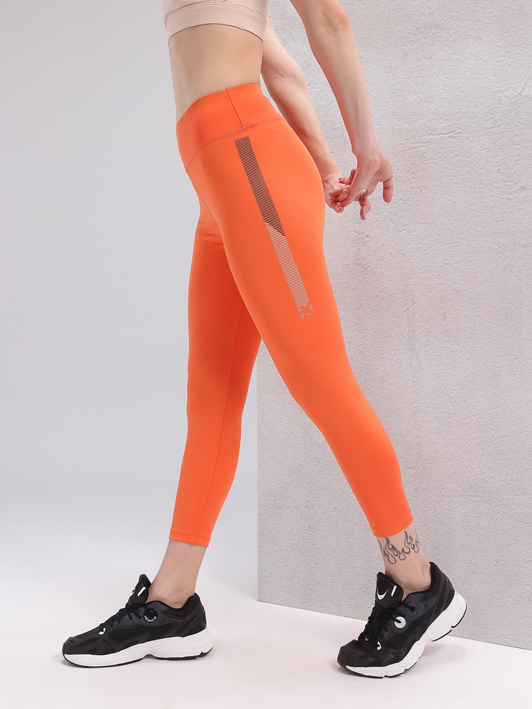 

HRX by Hrithik Roshan Women Rapid-Dry Cropped Training Tights, Orange