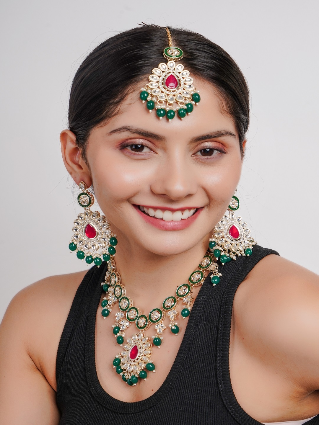 

Divisha Gold-Plated Stone Studded & Beaded Jewellery Set