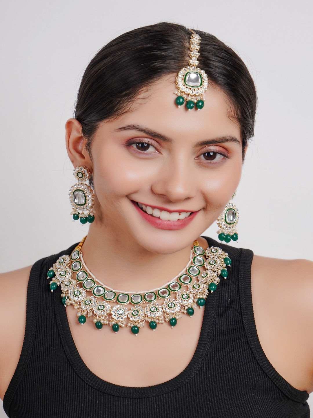 

Divisha Gold-Plated Stone Studded & Beaded Jewellery Set