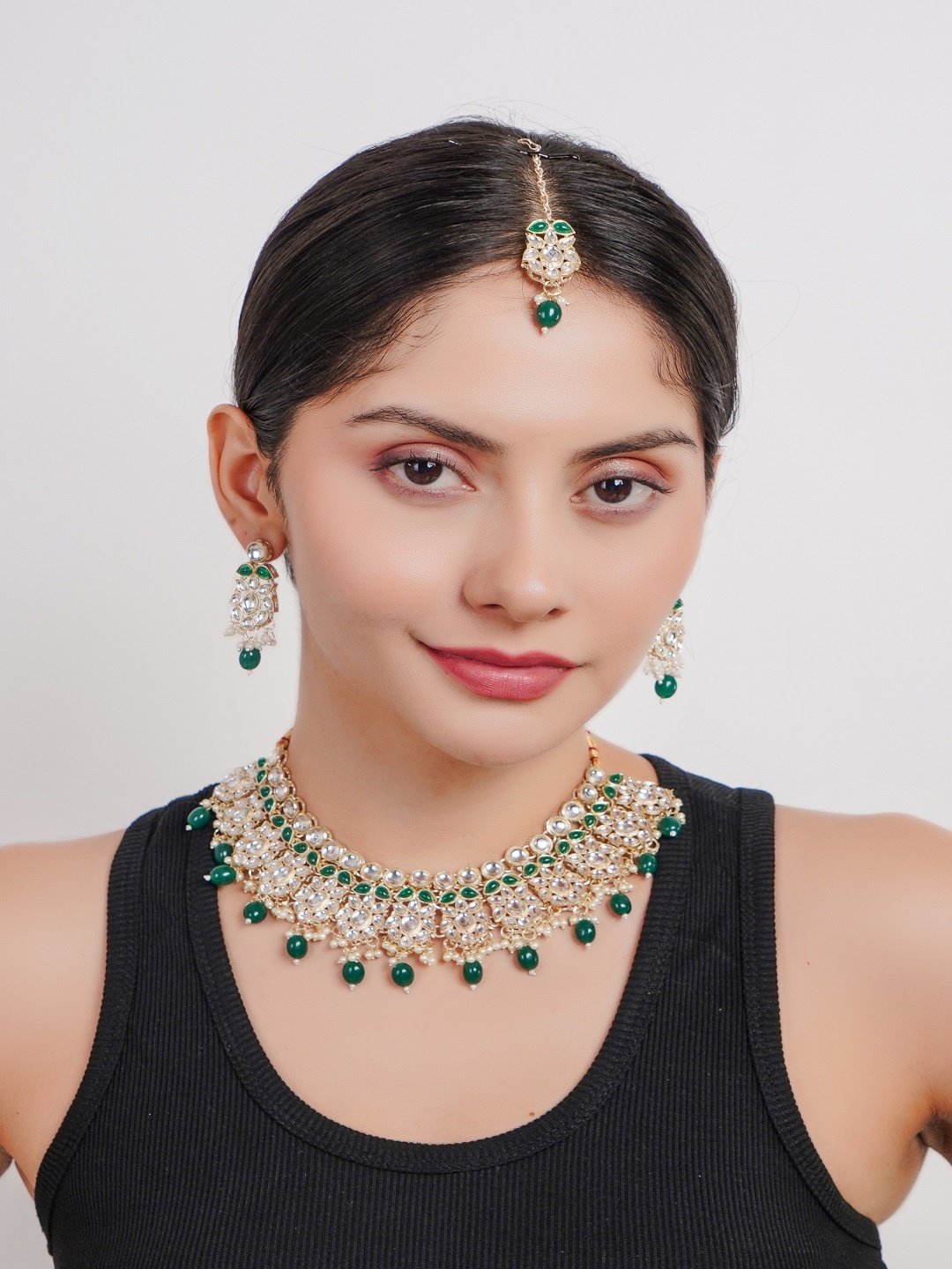 

Divisha Gold-Plated Stone-Studded & Beaded Jewellery Set