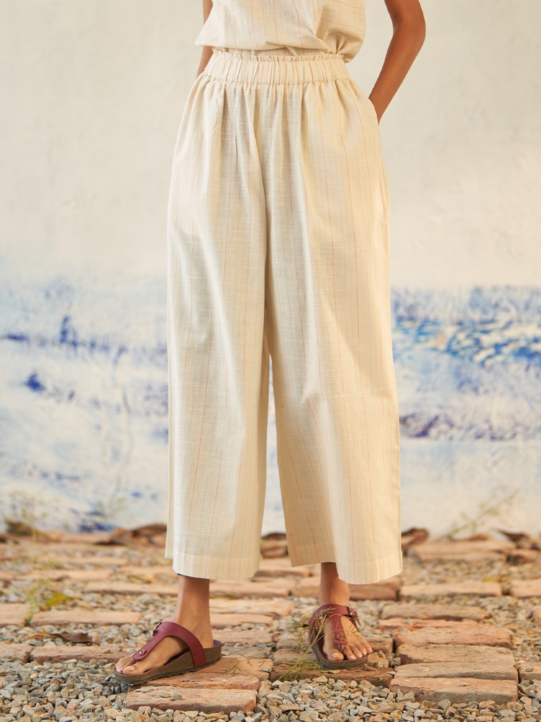 

Canoopi Women Striped Relaxed Flared Trousers, Beige