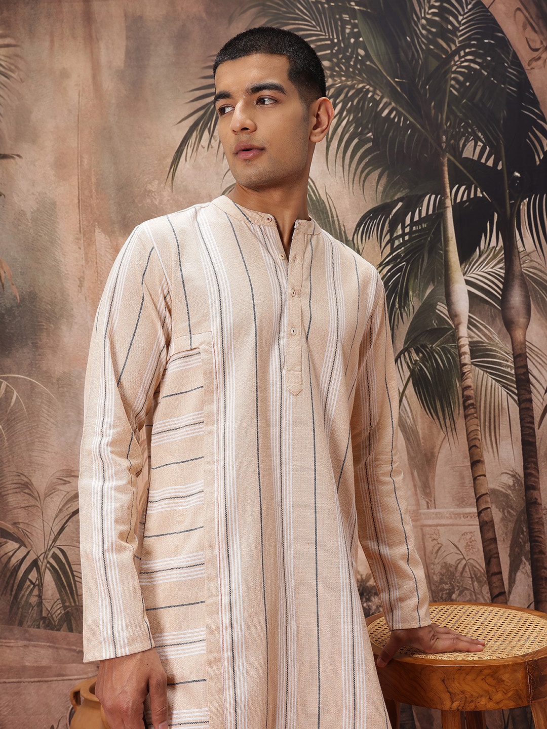 

Sangria Men Striped Panelled Asymmetric Hem Pure Cotton Kurta, Beige