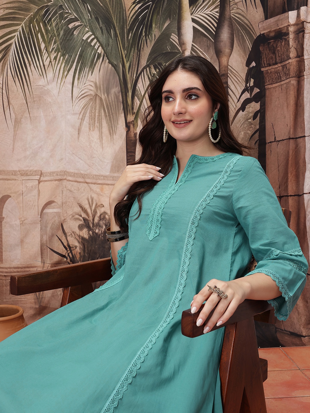 

Sangria Flared Sleeves Indigo Panelled A-Line Kurta with Lace Inserts, Sea green