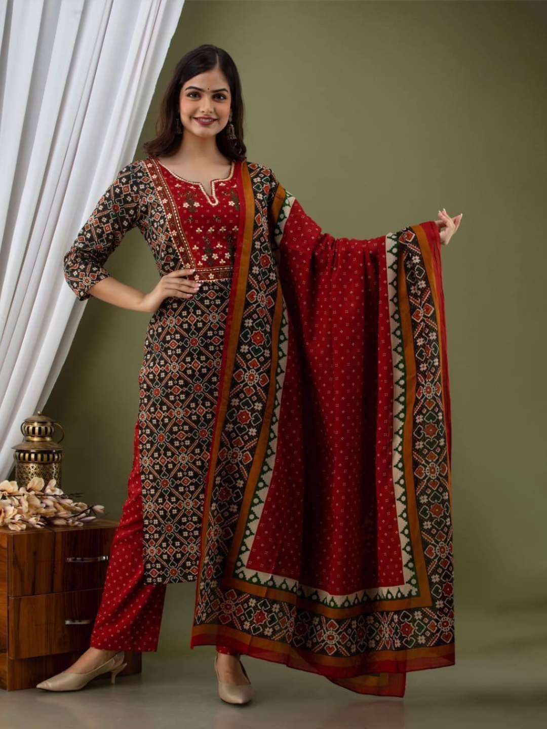 

Rujave Floral Printed Thread Work Pure Cotton Straight Kurta with Trousers & Dupatta, Maroon