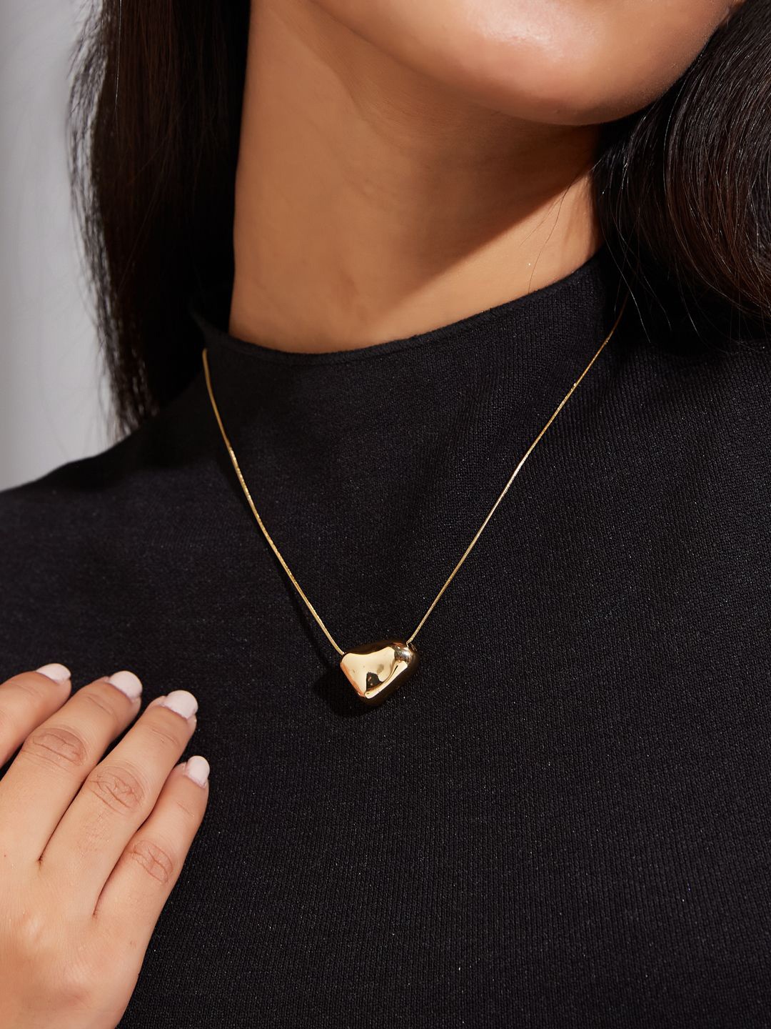 

Yinara Gold-Plated Stainless Steel Heart Shaped Pendant Chain
