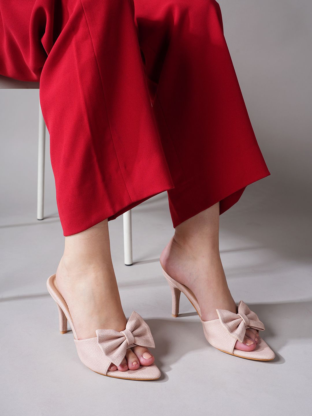 

Lavie Women Textured Slim Heeled Sandals with Bows, Nude