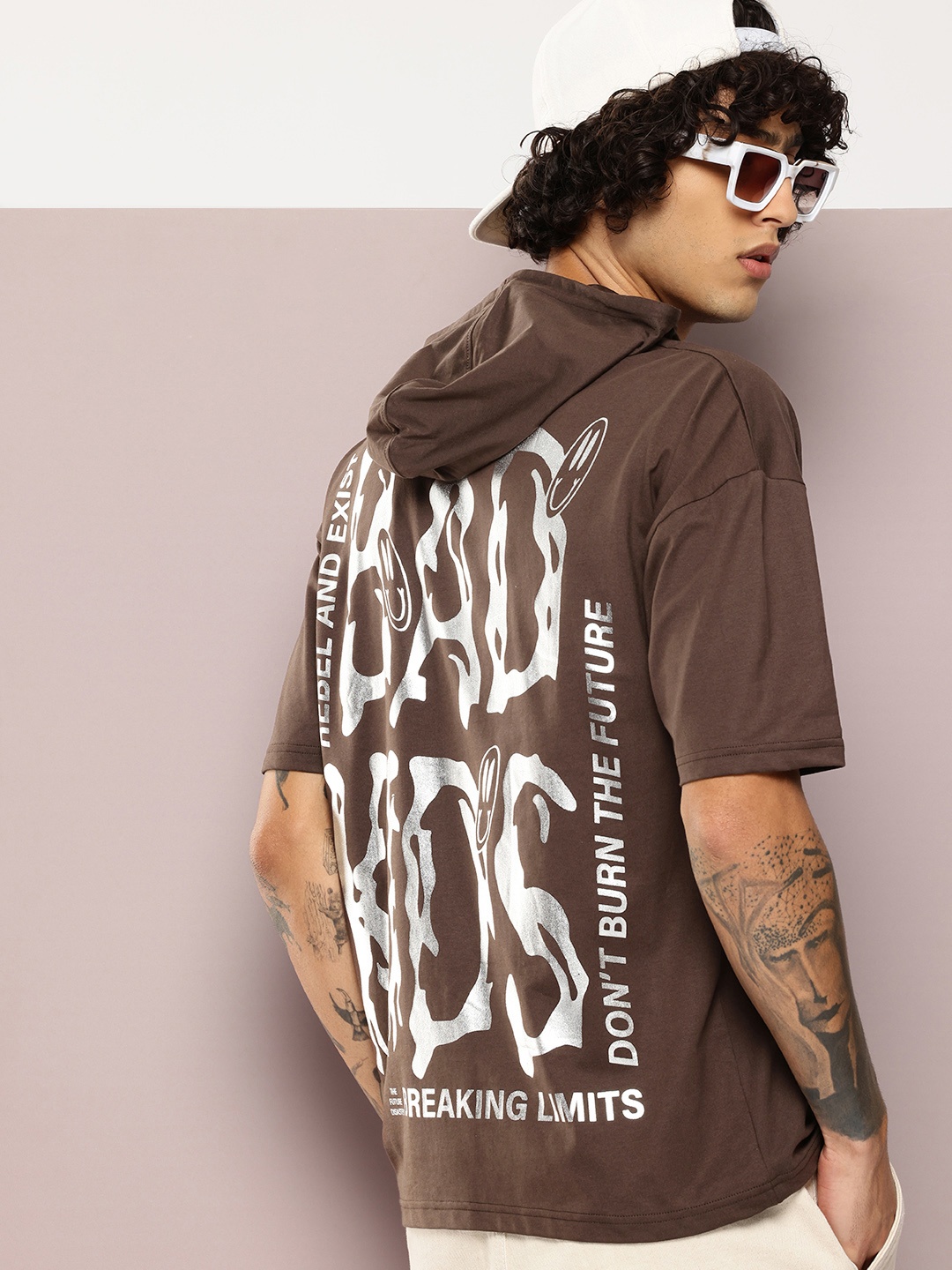 

Kook N Keech Men Typography Printed Hooded Drop-Shoulder Sleeves T-shirt, Brown