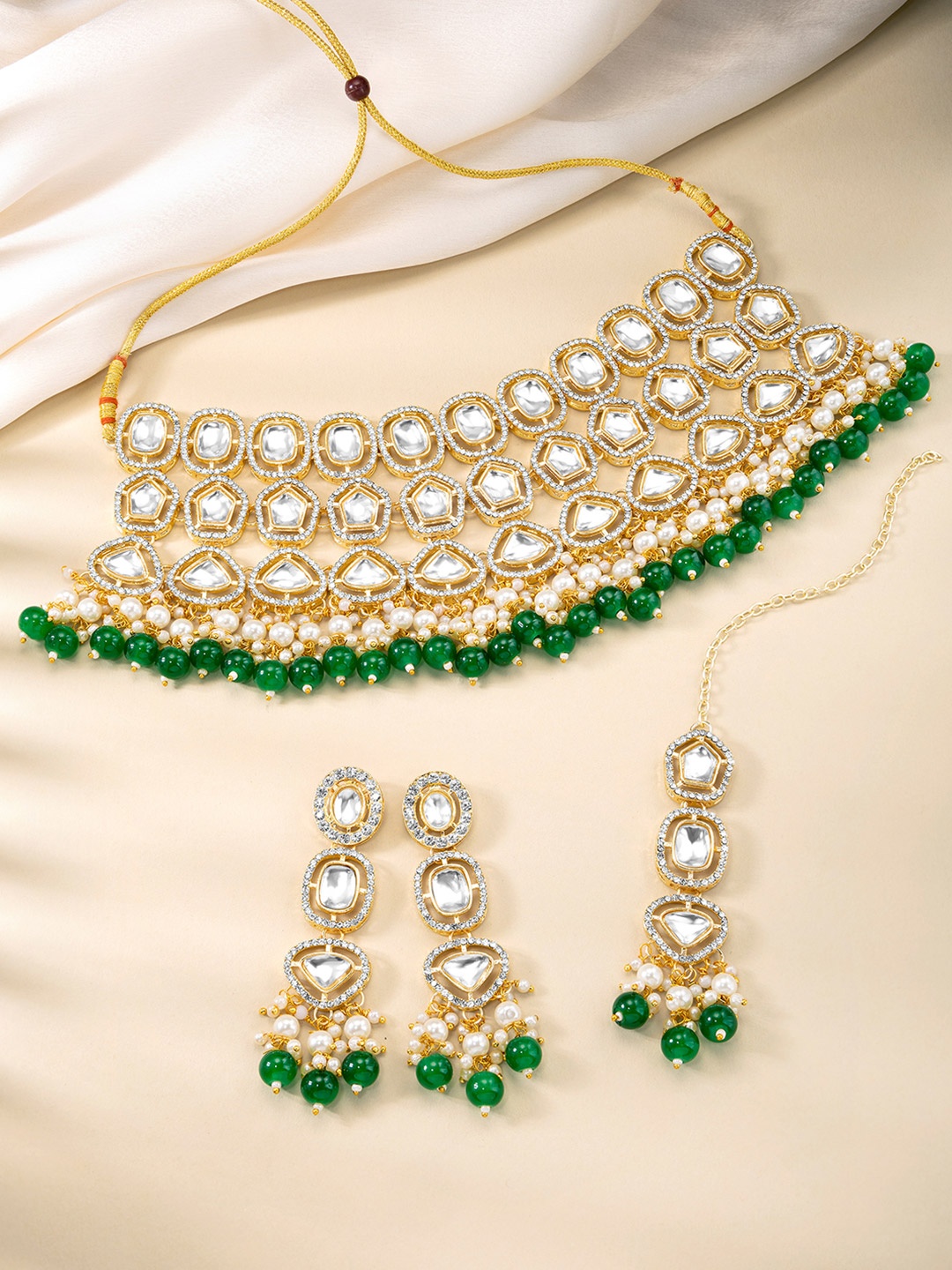 

Peora Gold Plated Artificial Stones And Beads Studded & Beaded Jewellery Set