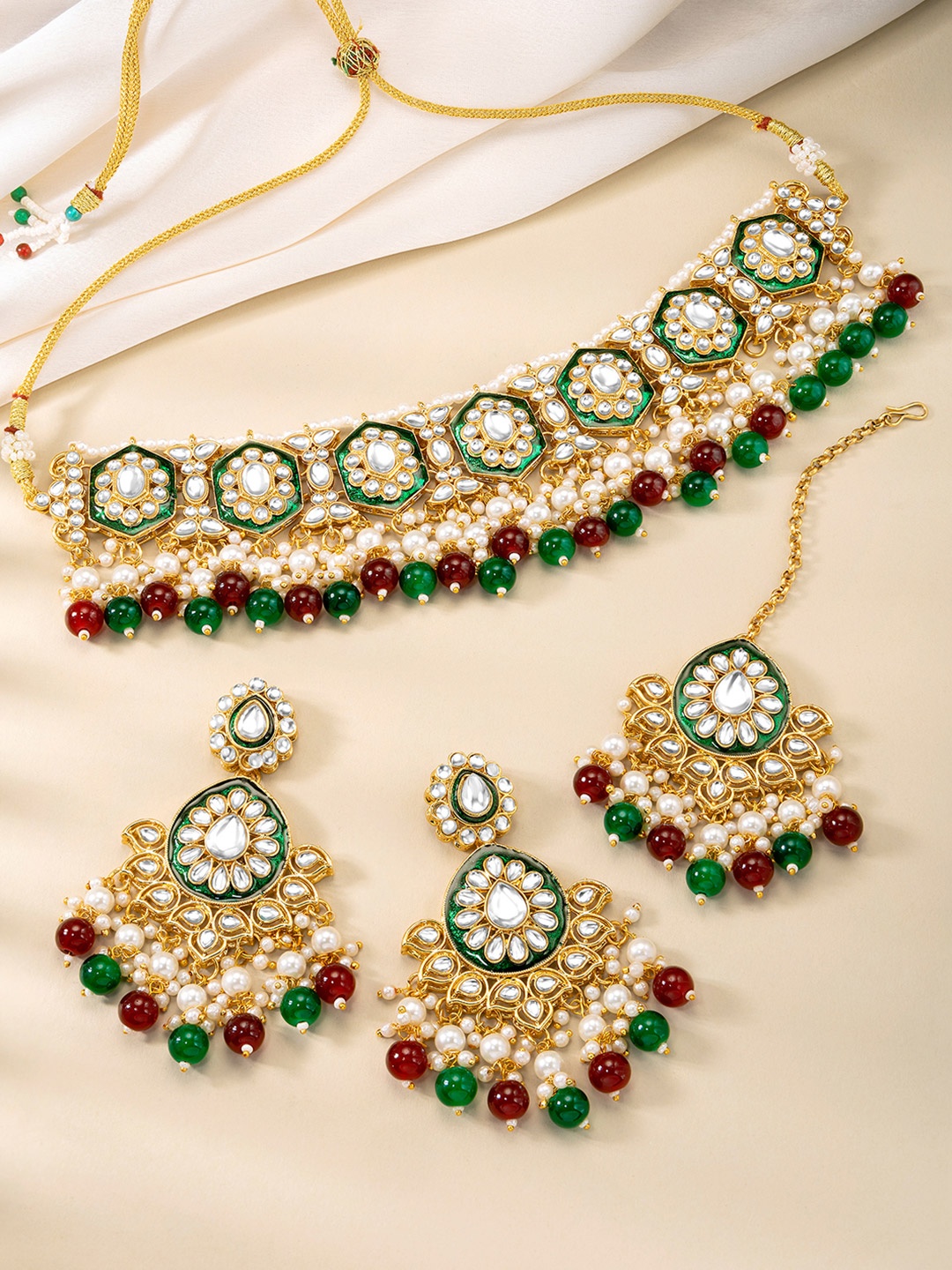 

Peora Gold Plated Kundan Stone Studded & Beaded Jewellery Set