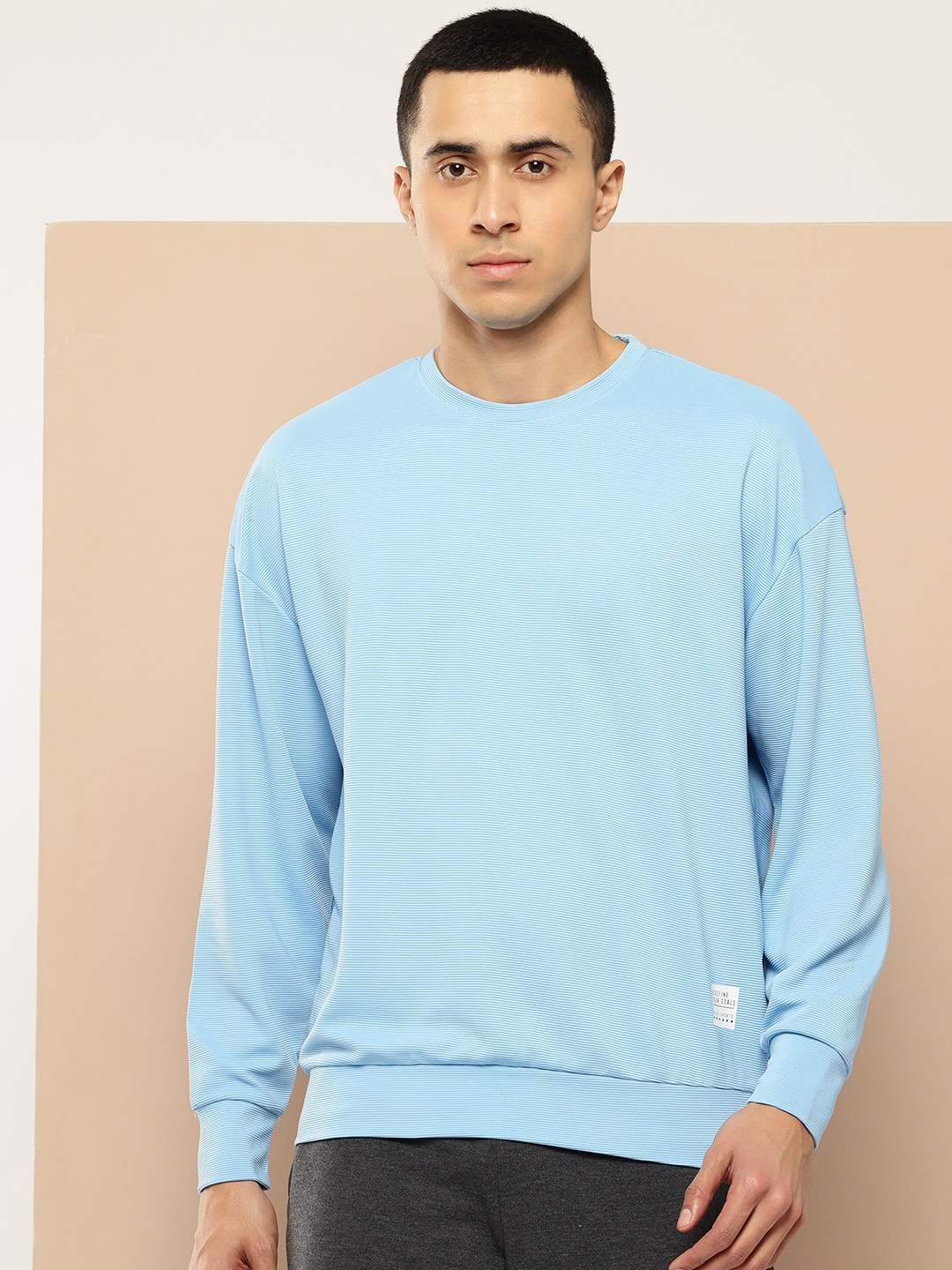 

Alcis Solid Drop Shoulder Sleeve Sweatshirt with Typography Detail, Blue