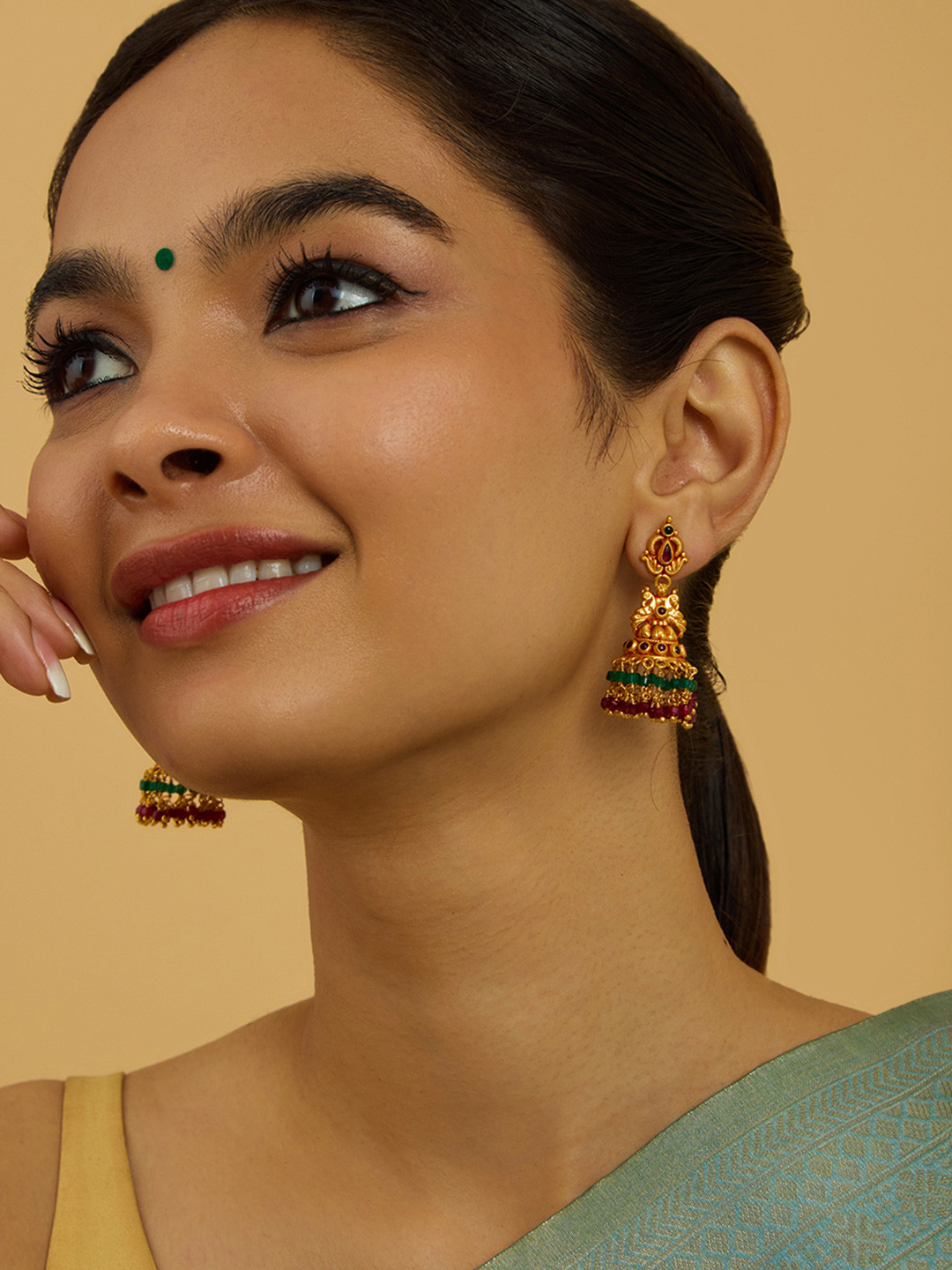 

Kushal's Fashion Jewellery 92.5 Pure Silver Gold-Plated Stone Studded Contemporary Jhumkas