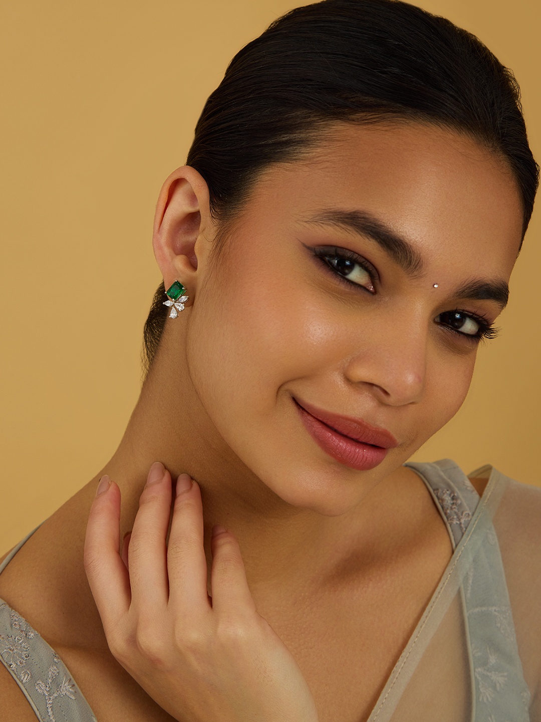 

Kushal's Fashion Jewellery Rhodium-Plated Leaf Shaped Zircon Studs Earrings, Green