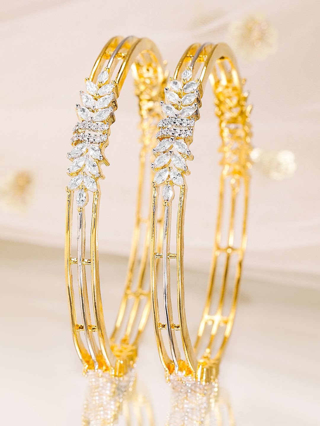 

Rubans Set of 2, 22K Gold-Plated Cubic Zirconia Studded Leaf Design Bangles