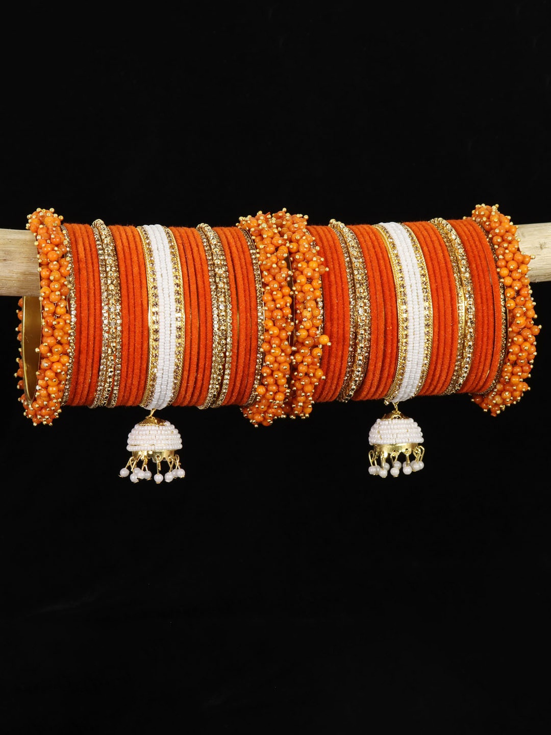 

ZULKASet of 54 Zircon Studded Velvet Bangles Chuda With Latkan, Orange