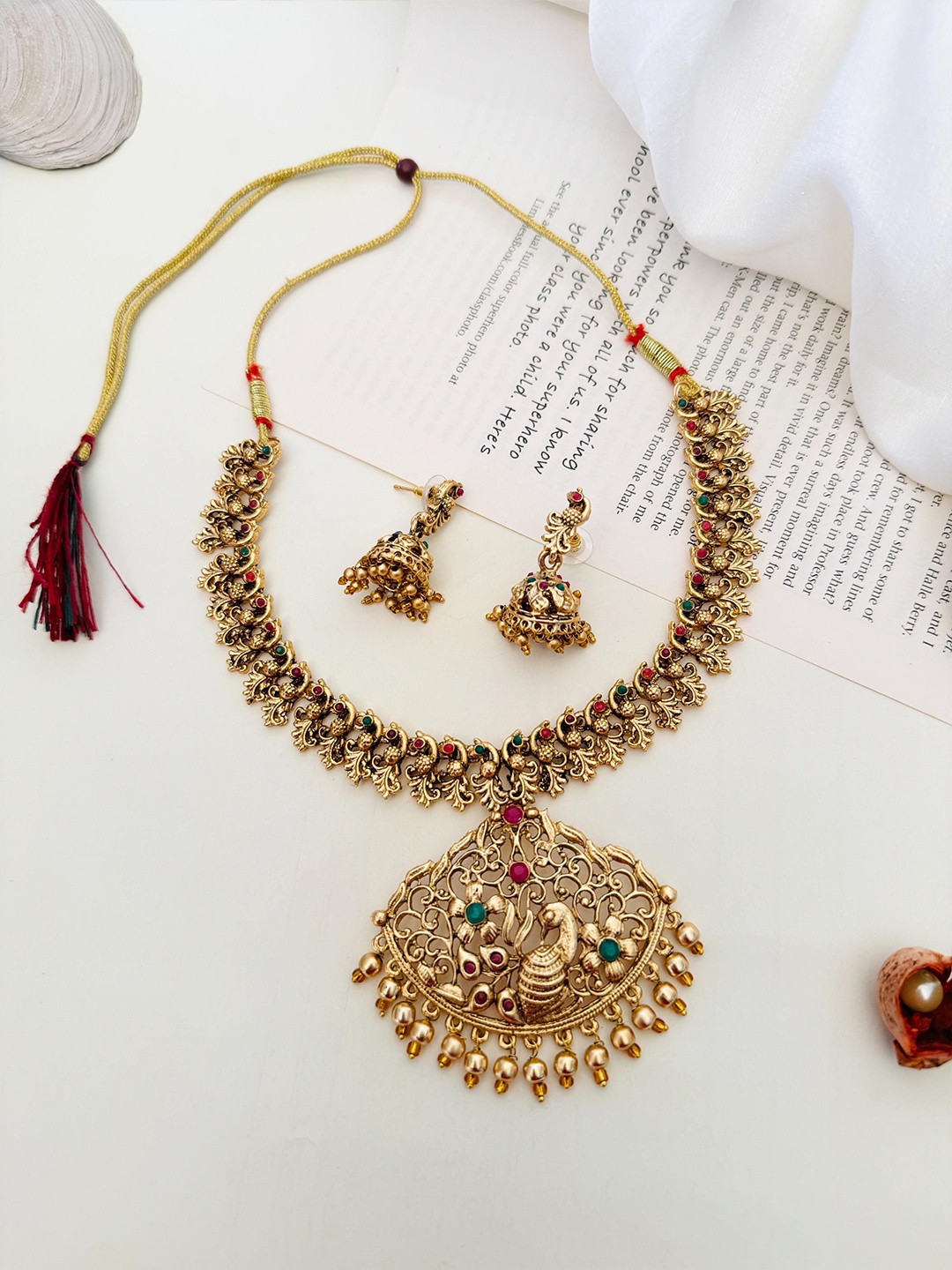 

ABDESIGNS Enchanting Gold-Plated Stone Studded Temple Jewellery Set