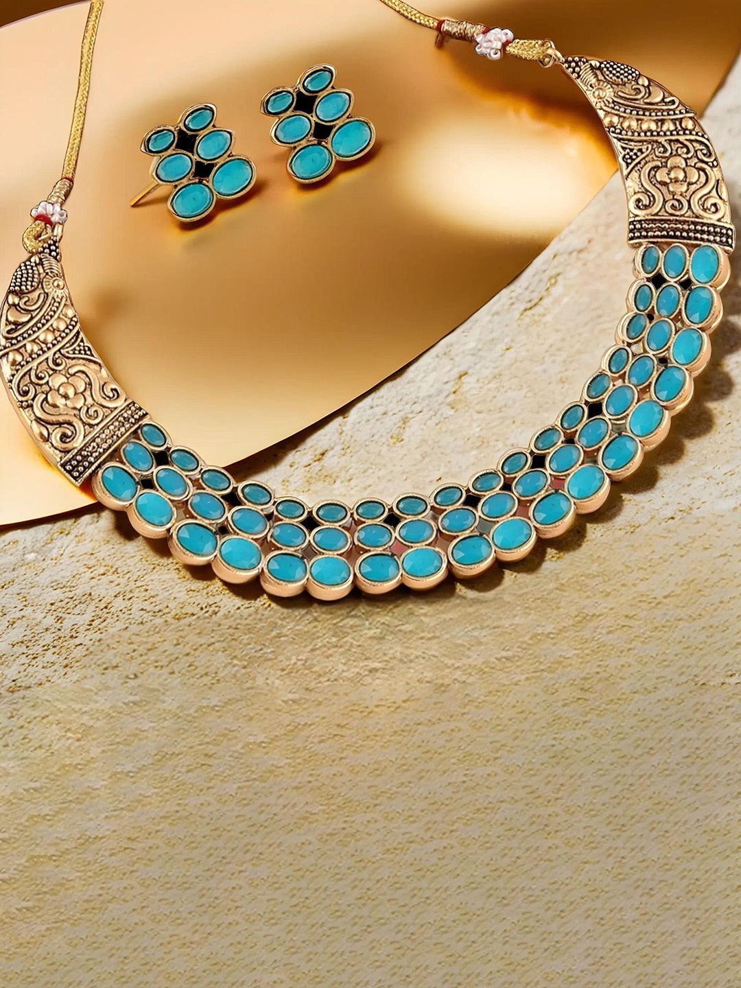 ORANGENYSHA Gold-Plated Stone-Studded Floral Design Kempu Choker Jewellery Set