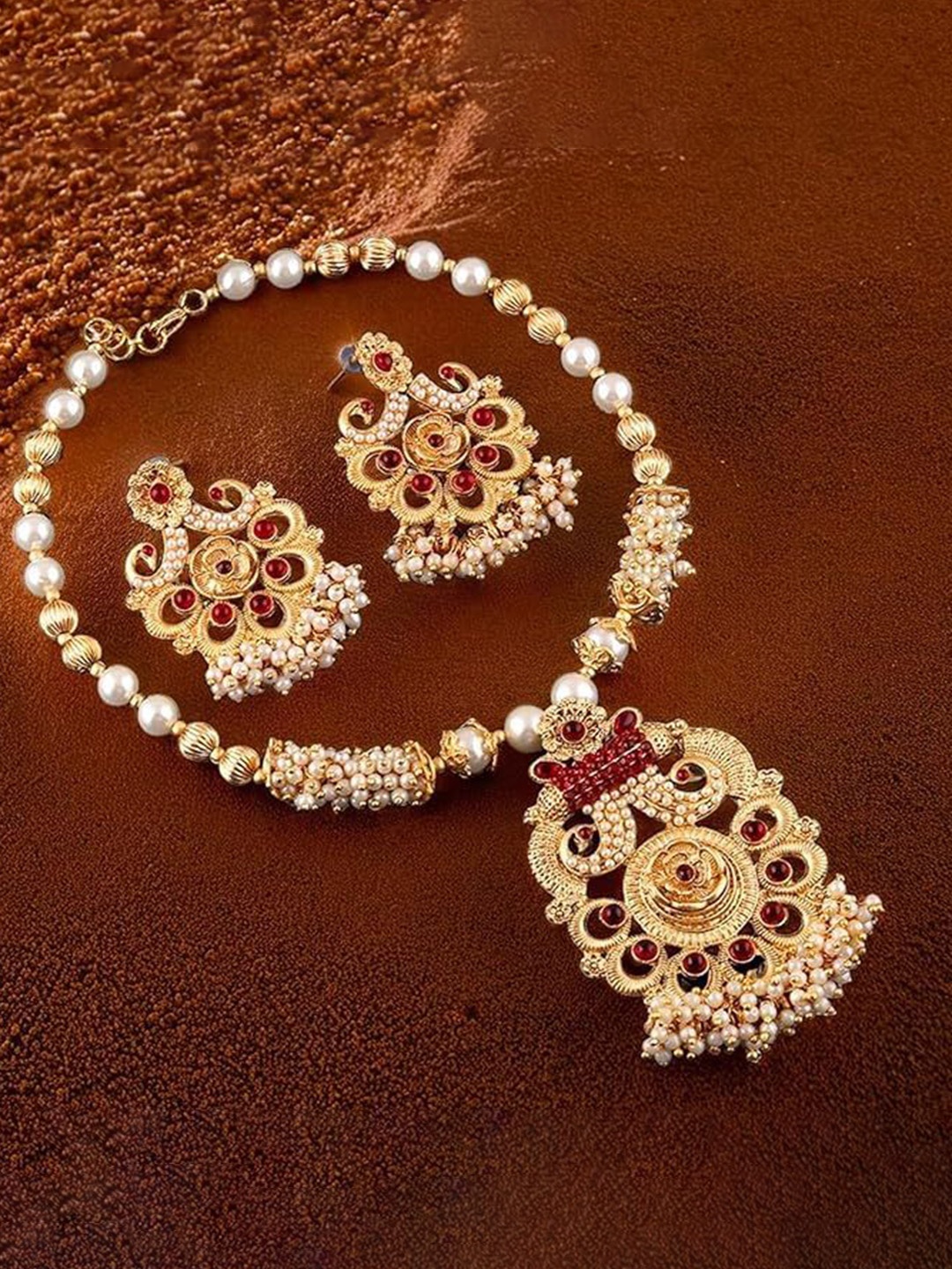 

ORANGENYSHA Gold-Plated Stone-Studded & Beaded Peacock Theme Temple Jewellery Set