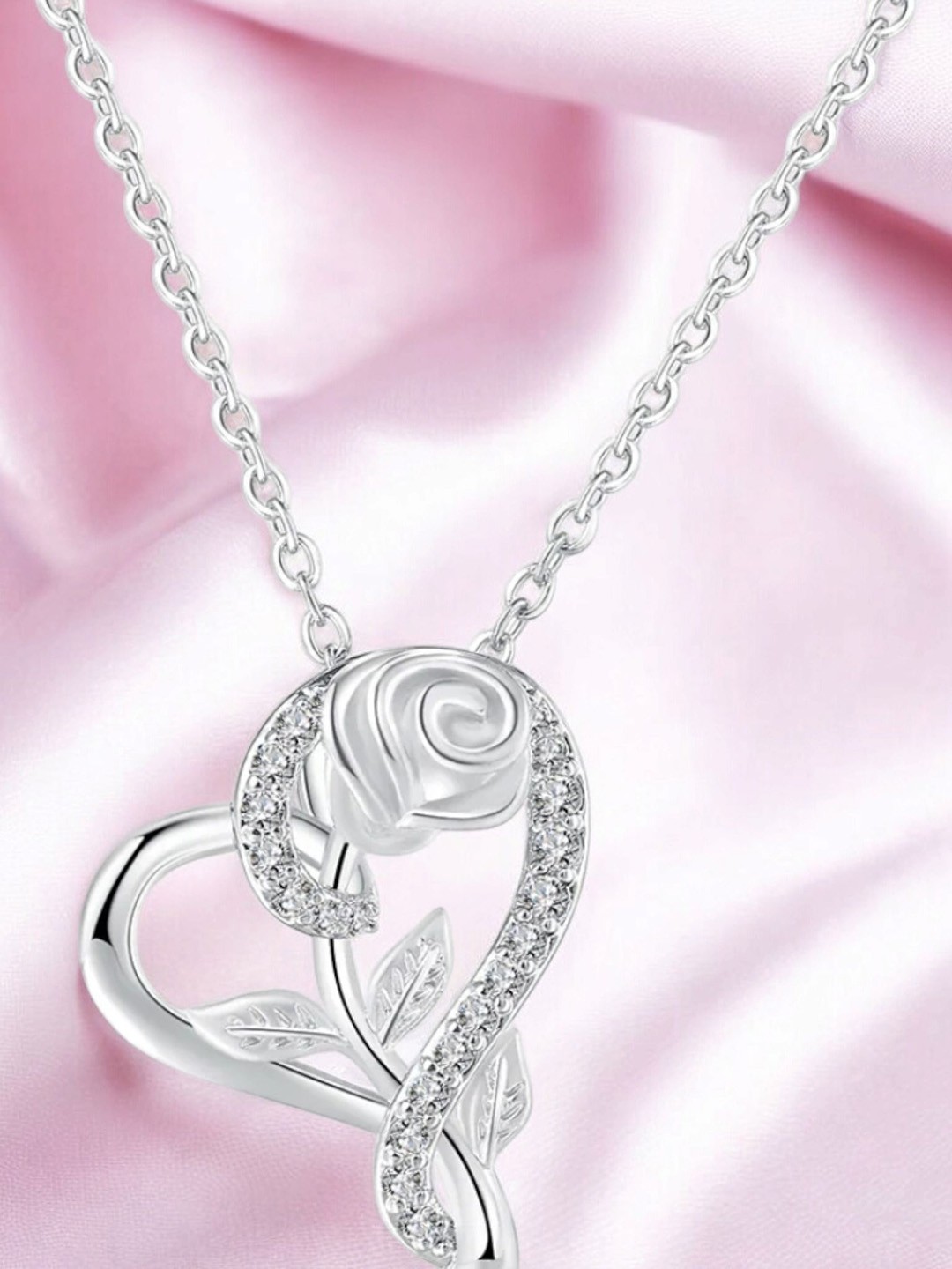 

Nilu's Collection Silver Plated Cubic Zirconia Heart Shaped Pendant with Chain
