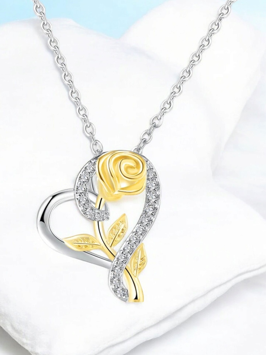 

Nilu's Collection Gold-Plated Cubic Zirconia Studded Heart Shaped Pendant with Chain