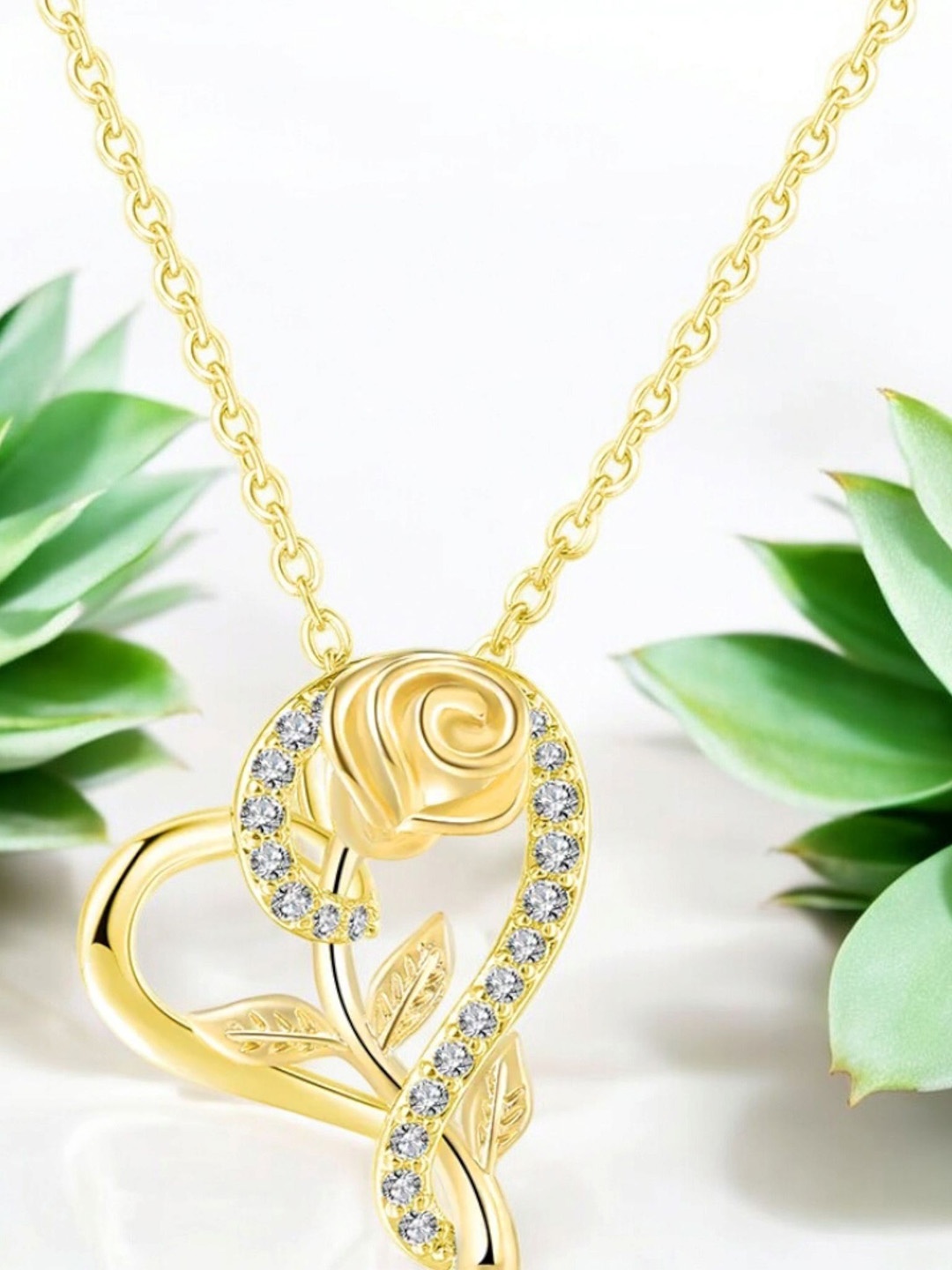 

Nilu's Collection Gold Plated Cubic Zirconia Heart Shaped Pendant with Chain