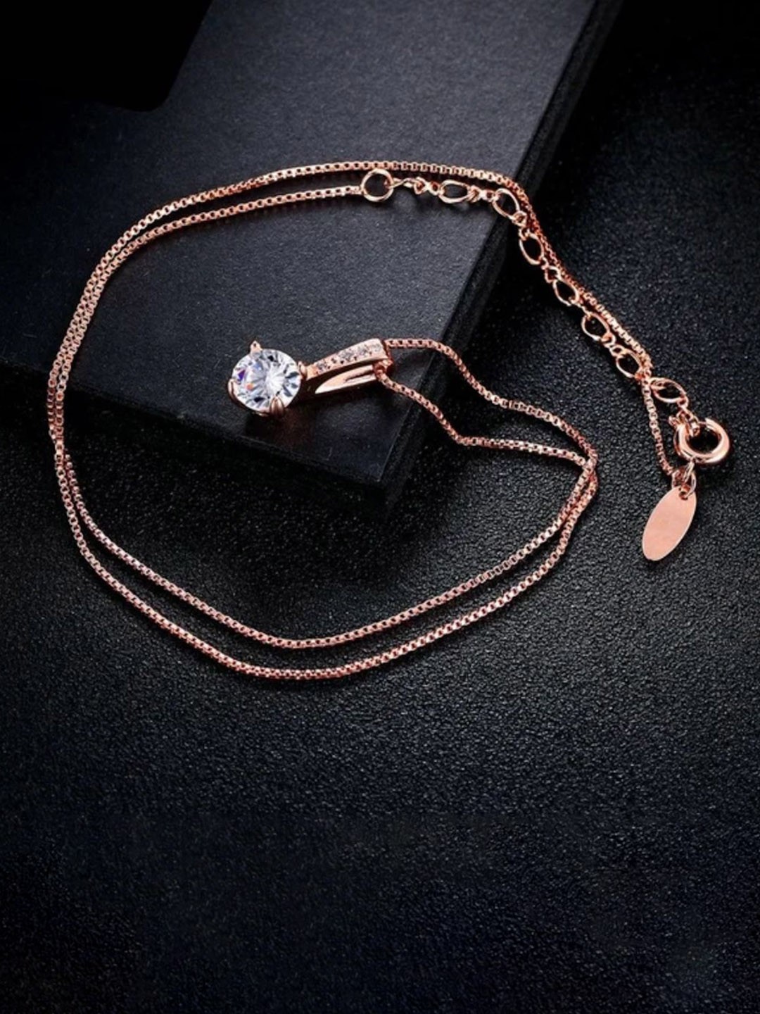 

Nilu's Collection Rose Gold Plated Cubic Zirconia Oval Pendant & Chain