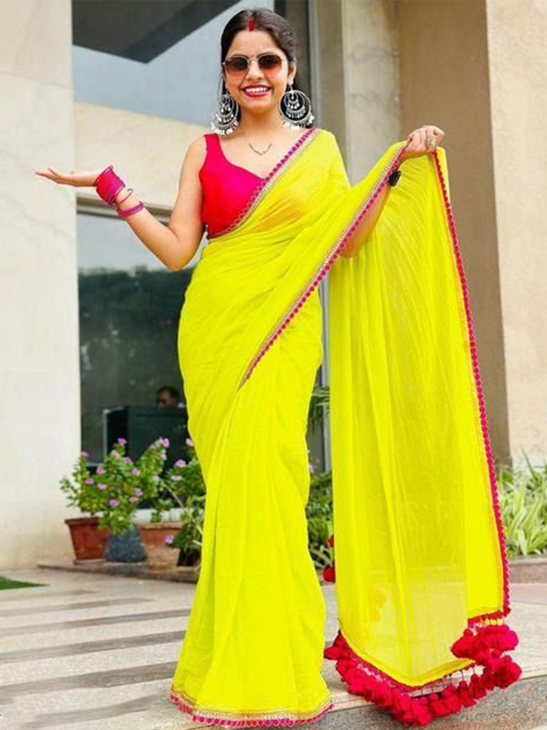 

SWADESI STUFF Women Sequinned Pure Georgette Saree, Yellow
