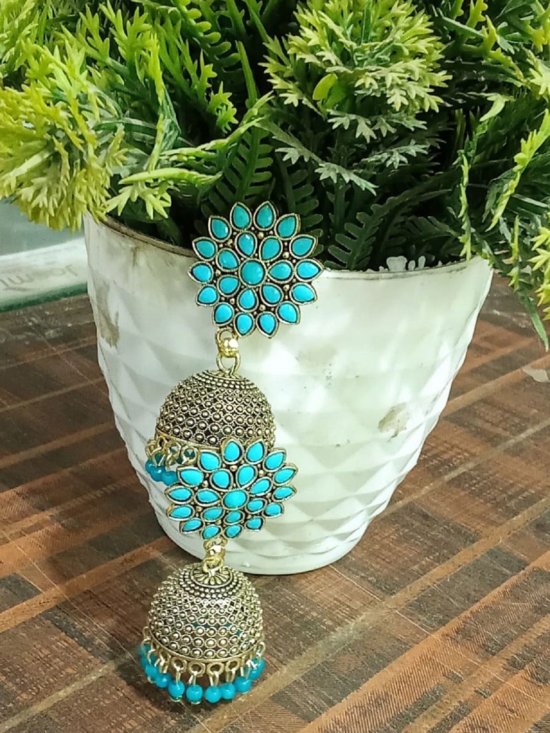 

JMBW INTERNATIONAL Gold Plated Kundan Studded Floral Jhumkas, Blue